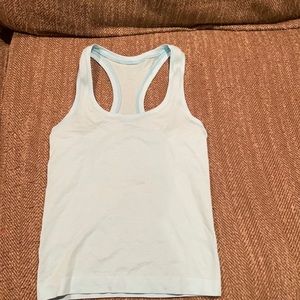Light blue lulu lemon size 0 tank top. Swiftly Tech Racerback Tank Top 2.0